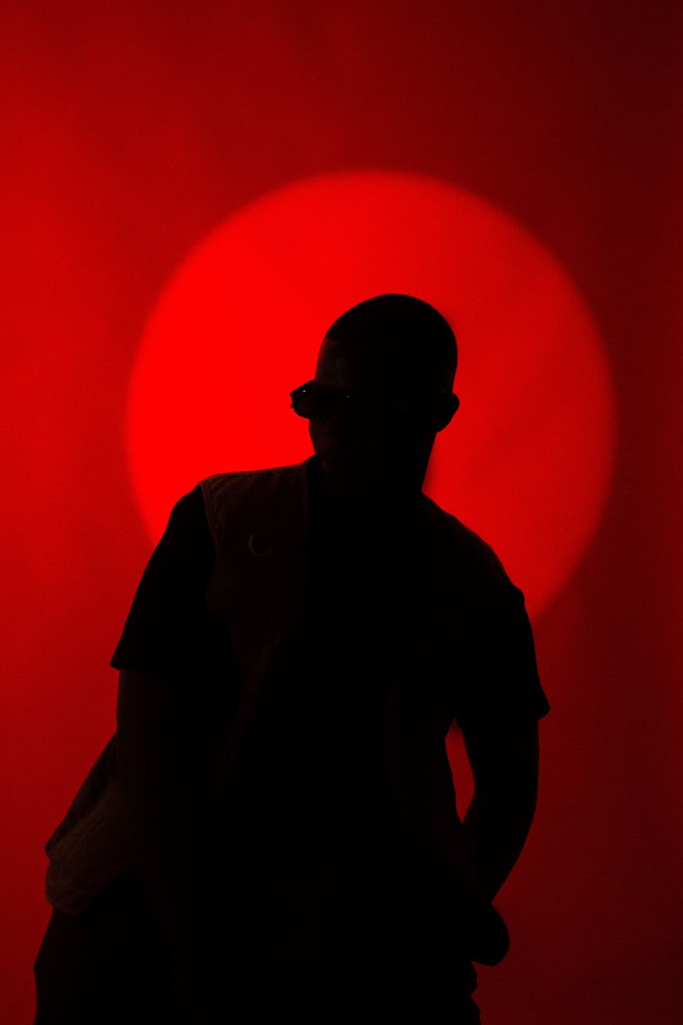 TAPIWA in silhouette against a red circle